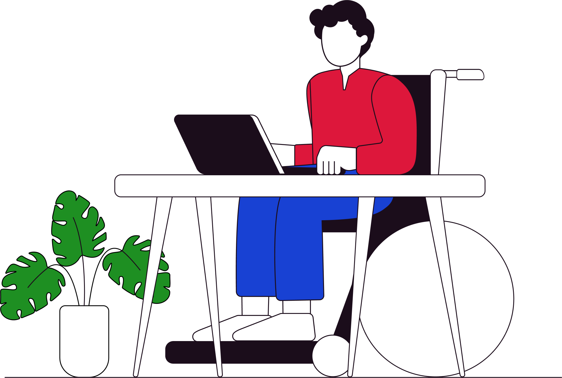 Person in wheelchair using a laptop at a desk, representing digital accessibility for all users